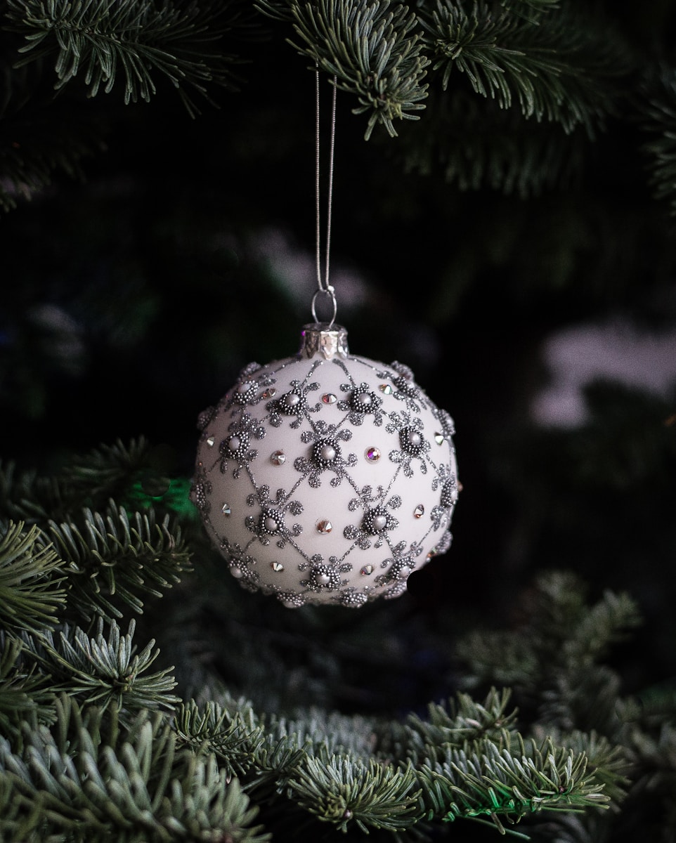 white and gray Christmas baubles